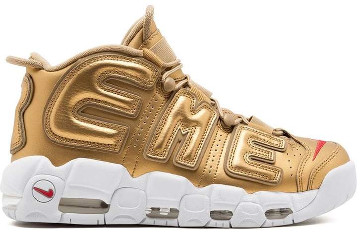 nike uptempo black and gold