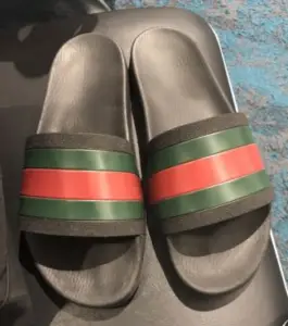 gucci flip flops on feet